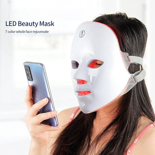 Nordic Glow LED Face Mask – woman wearing LED therapy mask at home